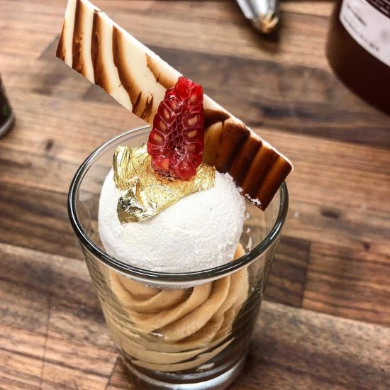 Mousse Dessert Cup with Gold Flake, Raspberry and Chocolate Toppings