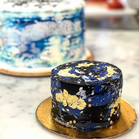 Blue and Black Cake with Gold Flakes